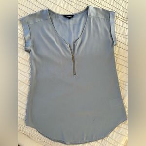 Lightweight and airy blouse with half zip front closure. Blue Gray